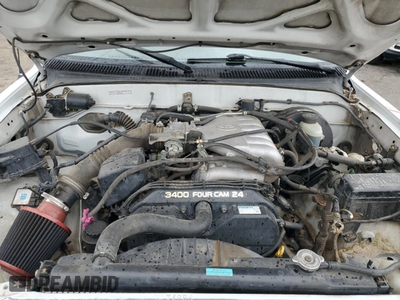 2002 Toyota Tacoma z VIN 5TEWN72N42Z895430, wystawiony jako Copart lot #57458155 z przebiegiem Nie podano mil oraz Szkoda całkowita • Salvage title. Historia ofert i sprzedaży dostępna na DreamBid. Obrazek 11.