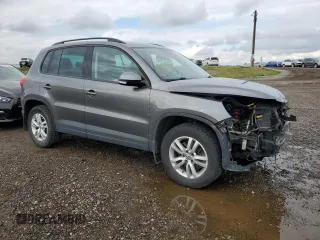 2017 Volkswagen Tiguan with VIN WVGHV7AX1HK017717, listed as a Copart auction lot 64948373 with 77,825 mi miles and Salvage title. Bid and sale history available at DreamBid. Image 4.