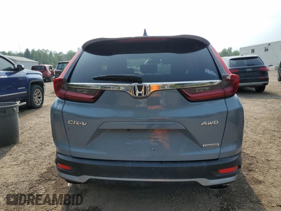 2020 Honda CR-V Touring z VIN 2HKRW2H9XLH236764, wystawiony jako Copart lot #59693475 z przebiegiem Nie podano mil oraz Czysty tytuł • Clean title. Historia ofert i sprzedaży dostępna na DreamBid. Obrazek 6.