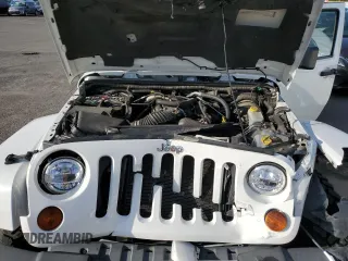 2010 Jeep Wrangler Sahara с VIN 1J4AA5D10AL181225, выставлен на аукционе Copart как лот 79696464 с пробегом 90 139 миль миль и Списание • Salvage title. История ставок и продаж доступна на DreamBid. Изображение 11.