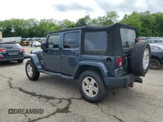 2008 Jeep Wrangler Unlimited Sahara with VIN 1J4GA59108L562831, listed as a Copart auction lot 58949225 with 206,312 mi miles and Clean title. Bid and sale history available at DreamBid. Image 2.