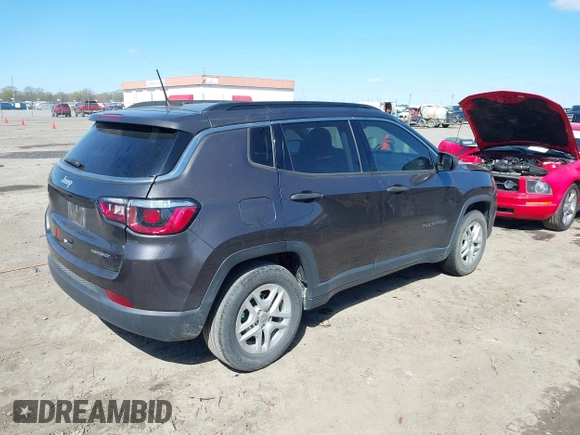 2019 Jeep Compass Sport with VIN 3C4NJCAB0KT613116, listed as a IAAI auction lot 39002435 with 59,805 mi miles and . Bid and sale history available at DreamBid. Image 4.