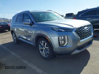 2020 Hyundai Palisade SEL z VIN KM8R34HE7LU117525, wystawiony jako IAAI lot #42120097 z przebiegiem 121 697 mil mil oraz . Historia ofert i sprzedaży dostępna na DreamBid. Obrazek 1.