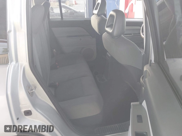 2007 Jeep Compass Sport with VIN 1J8FT47W37D200398, listed as a IAAI auction lot 40914539 with 183,664 mi miles. Bid and sale history available at carsss.com. Image 8.