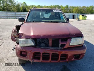 2003 Isuzu Rodeo z VIN 4S2DM58W634305399, wystawiony jako Copart lot #55258335 z przebiegiem 223 105 mil mil oraz Szkody całkowita. Historia ofert i sprzedaży dostępna na DreamBid. Obrazek 5.