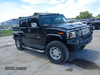 2004 Hummer H2 z VIN 5GRGN23U94H122582, wystawiony jako IAAI lot #42541864 z przebiegiem 105 764 mil mil oraz . Historia ofert i sprzedaży dostępna na DreamBid. Obrazek 1.