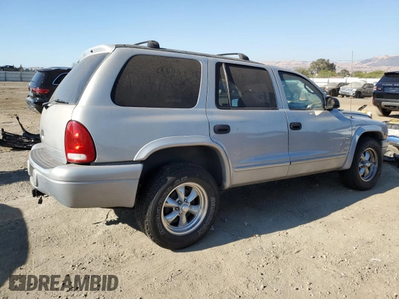 2000 Dodge Durango z VIN 1B4HR28Y4YF278422, wystawiony jako Copart lot #69119144 z przebiegiem 156 012 mil mil oraz Szkoda całkowita • Salvage title. Historia ofert i sprzedaży dostępna na DreamBid. Obrazek 3.