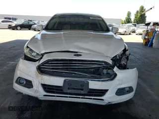 2013 Ford Fusion SE Hybrid with VIN 3FA6P0LU1DR192576, listed as a Copart auction lot 58025775 with 152,155 mi miles and Salvage title. Bid and sale history available at DreamBid. Image 5.