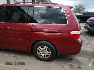2006 Honda Odyssey EX z VIN 5FNRL38436B058444, wystawiony jako Copart lot #70381084 z przebiegiem 181 928 mil mil oraz Szkoda całkowita • Salvage title. Historia ofert i sprzedaży dostępna na DreamBid. Obrazek 12.