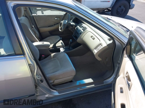 1999 Honda Accord LX with VIN JHMCG6650XC011621, listed as a IAAI auction lot 42401527 with 243,227 mi miles and . Bid and sale history available at DreamBid. Image 5.