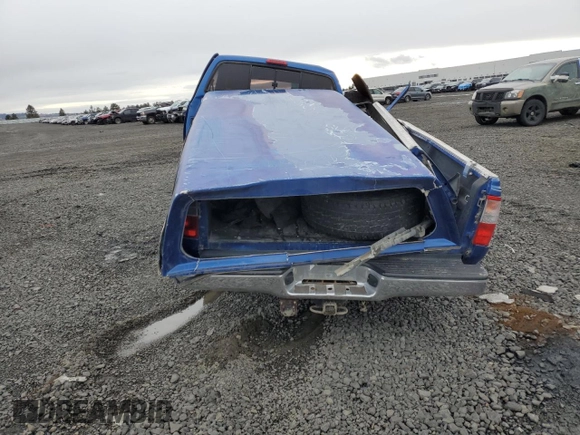 1994 Toyota T100 z VIN JT4VD20A0R0011799, wystawiony jako Copart lot #46150095 z przebiegiem 186 722 mil mil oraz Szkoda całkowita • Salvage title. Historia ofert i sprzedaży dostępna na DreamBid. Obrazek 6.