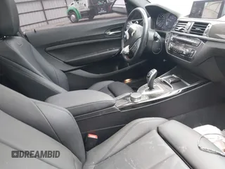 2020 BMW 2 Series 230i with VIN WBA2J1C03L7E53547, listed as a IAAI auction lot 42178031 with 50,028 mi miles and . Bid and sale history available at carsss.com. Image 5.