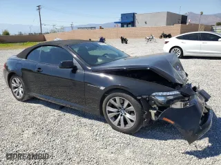 2009 BMW 6 Series 650i with VIN WBAEB53569C224337, listed as a Copart auction lot 68148974 with 75,057 mi miles and Salvage Title. Bid and sale history available at carsss.com. Image 4.
