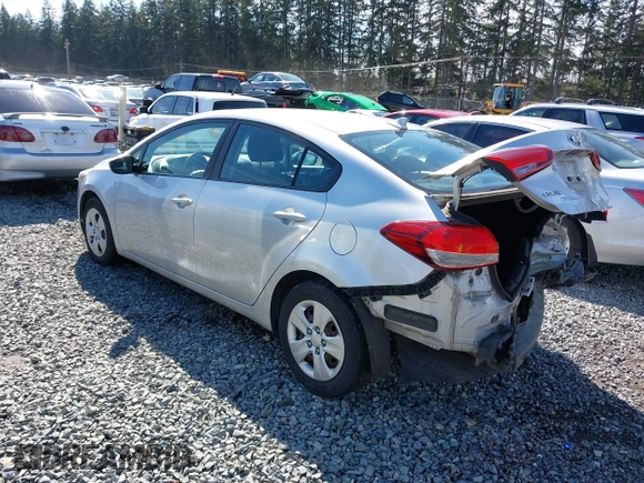 2017 Kia Forte LX with VIN 3KPFK4A7XHE018418, listed as a IAAI auction lot 41874292 with 87,608 mi miles. Bid and sale history available at carsss.com. Image 3.