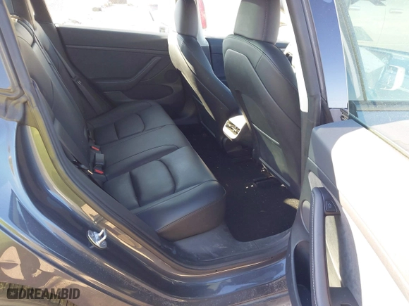 2023 Tesla Model 3 with VIN 5YJ3E1EA3PF678825, listed as a IAAI auction lot 41283153 with 8,607 mi miles. Bid and sale history available at carsss.com. Image 8.