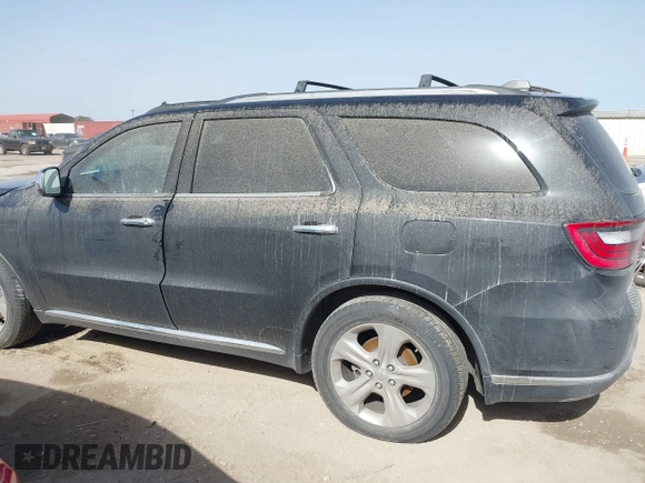 2015 Dodge Durango SXT with VIN 1C4RDHAG7FC155951, listed as a IAAI auction lot 41710153 with 180,519 mi miles and . Bid and sale history available at DreamBid. Image 14.