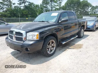 2007 Dodge Dakota SLT z VIN 1D7HW48P27S198997, wystawiony jako IAAI lot #42411491 z przebiegiem 183 825 mil mil oraz . Historia ofert i sprzedaży dostępna na DreamBid. Obrazek 2.