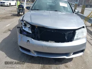 2013 Dodge Avenger SE V6 with VIN 1C3CDZAG2DN696519, listed as a IAAI auction lot 41705189 with 154,573 mi miles and . Bid and sale history available at DreamBid. Image 6.