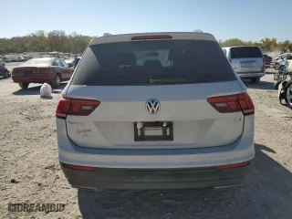 2018 Volkswagen Tiguan S with VIN 3VV1B7AX7JM013797, listed as a Copart auction lot 77445924 with 194,708 mi miles and Salvage Title. Bid and sale history available at carsss.com. Image 6.