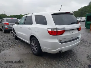 2013 Dodge Durango R/T with VIN 1C4SDHCT6DC672487, listed as a IAAI auction lot 42242172 with 185,074 mi miles and . Bid and sale history available at DreamBid. Image 3.