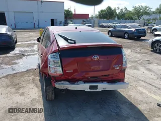 2007 Toyota Prius z VIN JTDKB20UX77547599, wystawiony jako IAAI lot #42138802 z przebiegiem Nie podano mil oraz . Historia ofert i sprzedaży dostępna na DreamBid. Obrazek 6.
