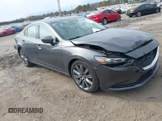 2019 Mazda 6 Touring with VIN JM1GL1VM5K1500899, listed as a IAAI auction lot 41773318 with 153,412 mi miles. Bid and sale history available at carsss.com. Image 1.