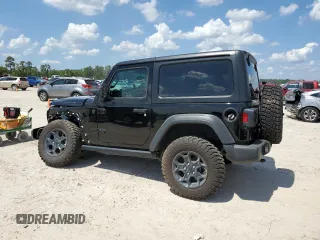 2023 Jeep Wrangler Sport with VIN 1C4HJXAG3PW672856, listed as a Copart auction lot 70444274 with 6,077 mi miles and Salvage title. Bid and sale history available at DreamBid. Image 2.