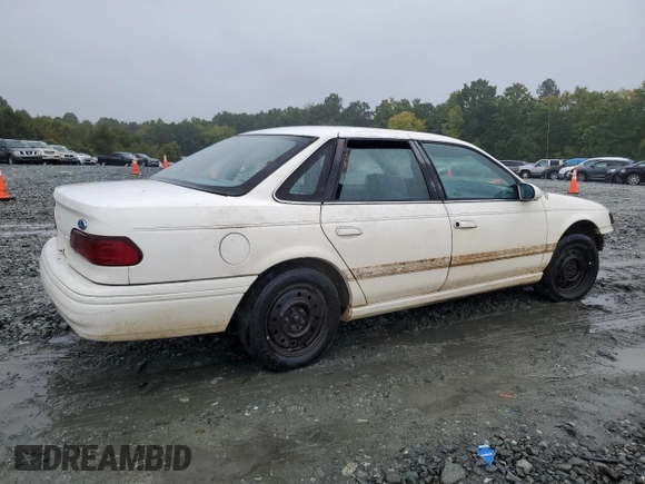 1994 Ford Taurus GL z VIN 1FALP52U5RA152732, wystawiony jako Copart lot #70472324 z przebiegiem 52 781 mil mil oraz Szkoda całkowita • Salvage title. Historia ofert i sprzedaży dostępna na DreamBid. Obrazek 3.