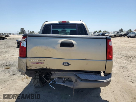 2001 Ford Explorer Sport Trac with VIN 1FMZU67E61UC71358, listed as a Copart auction lot 57982355 with 108,601 mi miles and Salvage title. Bid and sale history available at DreamBid. Image 6.
