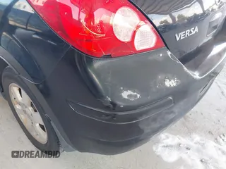2009 Nissan Versa S z VIN 3N1BC13E19L476855, wystawiony jako IAAI lot #42319486 z przebiegiem 98 425 mil mil oraz . Historia ofert i sprzedaży dostępna na DreamBid. Obrazek 14.