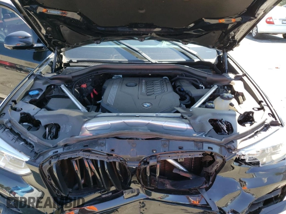 2021 BMW X4 M40i with VIN 5UX2V5C01M9F81840, listed as a Copart auction lot 56868653 with 0 mi miles. Bid and sale history available at carsss.com. Image 12.