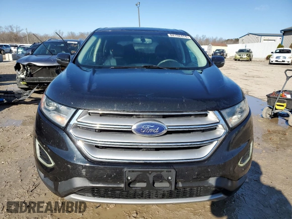2015 Ford Edge Titanium z VIN 2FMTK3K91FBB52506, wystawiony jako Copart lot #84192474 z przebiegiem 136 437 mil mil oraz Nie do naprawy • Non repairable. Historia ofert i sprzedaży dostępna na DreamBid. Obrazek 5.