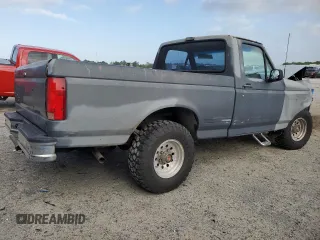 1992 Ford F-150 with VIN 1FTDF15Y4NLA94328, listed as a Copart auction lot 51690965 with 191,656 mi miles and Salvage Title. Bid and sale history available at carsss.com. Image 3.