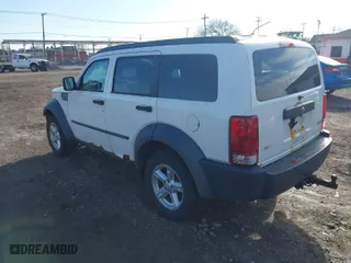 2007 Dodge Nitro SXT with VIN 1D8GU28K07W712036, listed as a IAAI auction lot 41982161 with 164,759 mi miles. Bid and sale history available at carsss.com. Image 3.