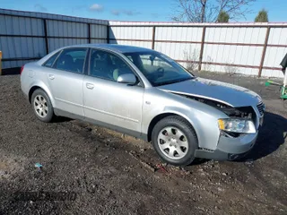 2003 Audi A4 1.8T with VIN WAULC68EX3A212780, listed as a IAAI auction lot 41986379 with 185,085 mi miles. Bid and sale history available at carsss.com. Image 1.