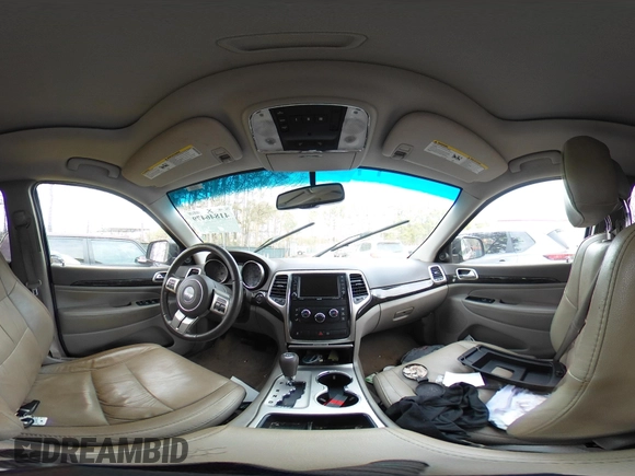 2012 Jeep Grand Cherokee Laredo with VIN 1C4RJEAG0CC316823, listed as a IAAI auction lot 41846479 with 215,317 mi miles. Bid and sale history available at carsss.com. Image 18.