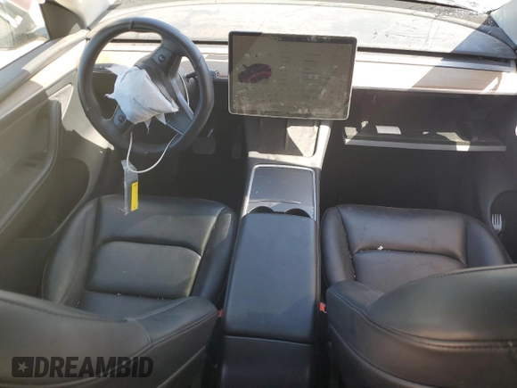 2022 Tesla Model Y Long Range z VIN 7SAYGAEE4NF543503, wystawiony jako Copart lot #47143155 z przebiegiem 53 874 mil mil oraz Szkody całkowita. Historia ofert i sprzedaży dostępna na DreamBid. Obrazek 8.
