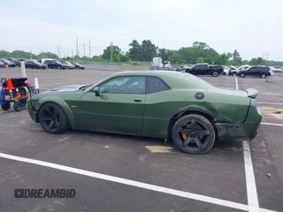 2021 Dodge Challenger R/T Scat Pack z VIN 2C3CDZFJ2MH559741, wystawiony jako IAAI lot #42264991 z przebiegiem 51 040 mil mil oraz . Historia ofert i sprzedaży dostępna na DreamBid. Obrazek 14.