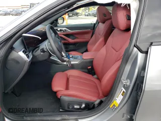 2023 BMW i4 eDrive40 z VIN WBY73AW06PFN71873, wystawiony jako Copart lot #37268403 z przebiegiem 803 mil mil oraz . Historia ofert i sprzedaży dostępna na DreamBid. Obrazek 7.