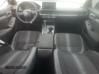2023 Honda Civic Sport z VIN 2HGFE2F57PH520634, wystawiony jako Copart lot #51852665 z przebiegiem 52 641 mil mil oraz Szkoda całkowita • Salvage title. Historia ofert i sprzedaży dostępna na DreamBid. Obrazek 8.