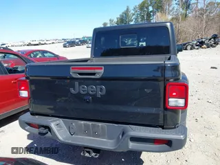 2023 Jeep Gladiator Sport S z VIN 1C6HJTAG8PL528821, wystawiony jako IAAI lot #41777653 z przebiegiem 65 656 mil mil oraz . Historia ofert i sprzedaży dostępna na DreamBid. Obrazek 16.