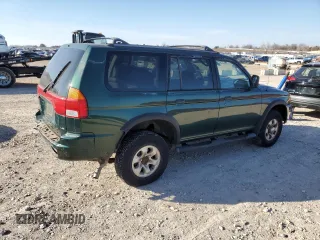 1999 Mitsubishi Montero LS z VIN JA4LS31H5XP033598, wystawiony jako Copart lot #85609464 z przebiegiem 185 686 mil mil oraz Szkoda całkowita • Salvage title. Historia ofert i sprzedaży dostępna na DreamBid. Obrazek 3.