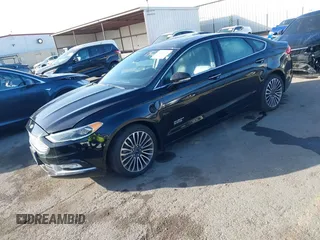2017 Ford Fusion Energi SE with VIN 3FA6P0PU0HR129792, listed as a IAAI auction lot 41104376 with 86,659 mi miles. Bid and sale history available at carsss.com. Image 2.