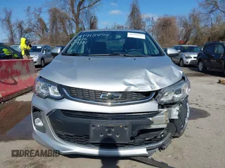 2018 Chevrolet Sonic LT z VIN 1G1JD5SG6J4132523, wystawiony jako IAAI lot #41918454 z przebiegiem 59 332 mil mil oraz . Historia ofert i sprzedaży dostępna na DreamBid. Obrazek 13.