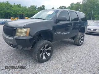 2007 Chevrolet Tahoe LT with VIN 1GNFK13017J290475, listed as a IAAI auction lot 42352808 with 148,086 mi miles and . Bid and sale history available at DreamBid. Image 2.