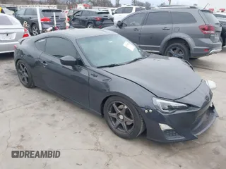 2016 Scion FR-S with VIN JF1ZNAA15G8708350, listed as a IAAI auction lot 41679656 with 111,245 mi miles. Bid and sale history available at carsss.com. Image 1.