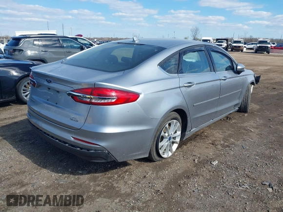 2020 Ford Fusion SE z VIN 3FA6P0LU8LR163896, wystawiony jako IAAI lot #41994803 z przebiegiem 89 892 mil mil oraz . Historia ofert i sprzedaży dostępna na DreamBid. Obrazek 4.