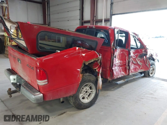 2000 Dodge Dakota Sport z VIN 1B7GG2AN5YS793828, wystawiony jako IAAI lot #41955863 z przebiegiem 267 861 mil mil oraz . Historia ofert i sprzedaży dostępna na DreamBid. Obrazek 4.
