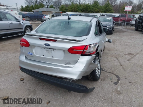 2015 Ford Focus SE with VIN 1FADP3F24FL347206, listed as a IAAI auction lot 41941987 with 96,473 mi miles and . Bid and sale history available at DreamBid. Image 4.