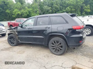 2018 Jeep Grand Cherokee Laredo E with VIN 1C4RJFAG4JC138319, listed as a Copart auction lot 54956925 with 144,938 mi miles and Salvage title. Bid and sale history available at DreamBid. Image 2.